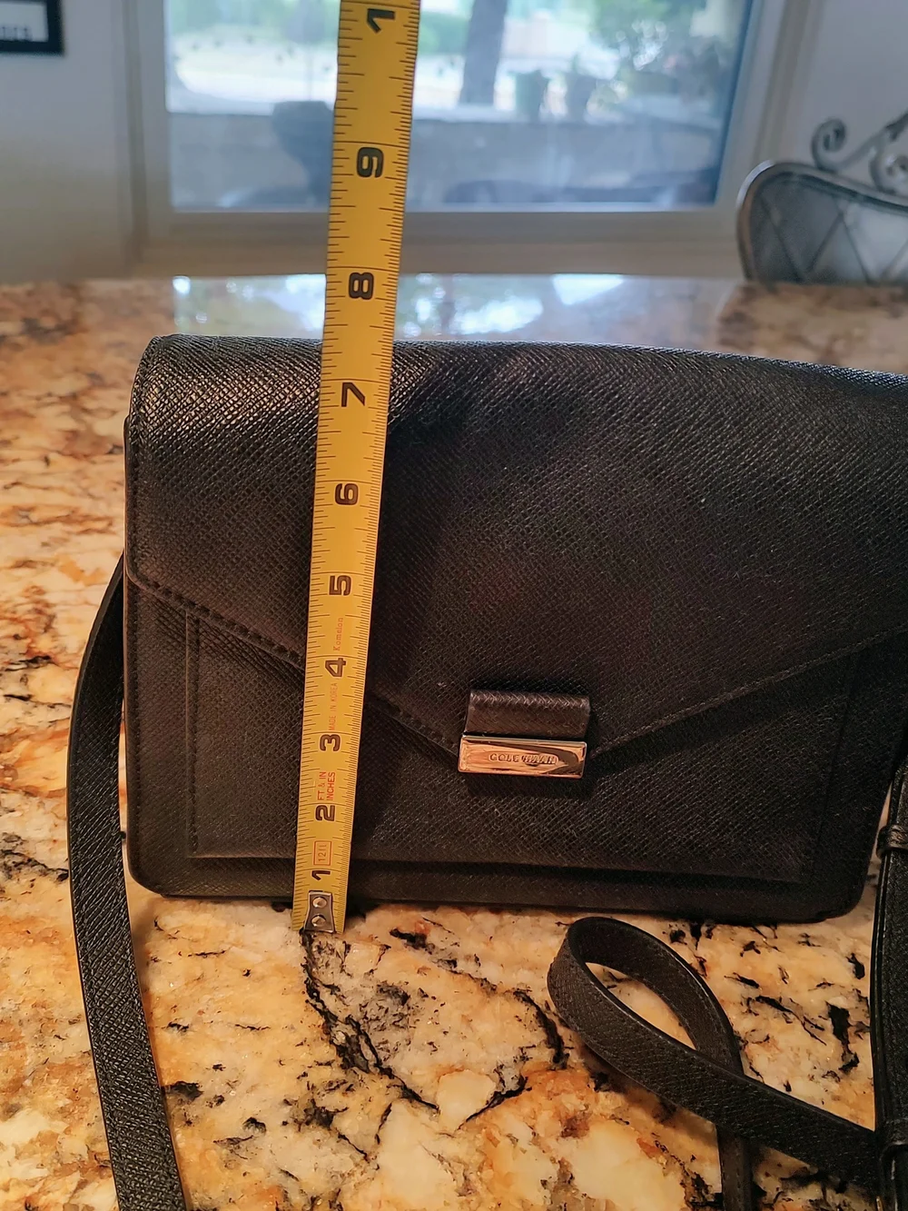 Cole Haan Black Leather Messenger Bag with Silver Hardware